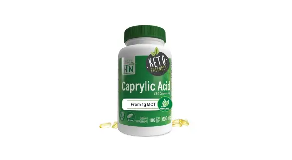 Biała butelka z zieloną nakrętką, zawierająca suplement diety Kwas Kaprylowy (Caprylic Acid) w kapsułkach.