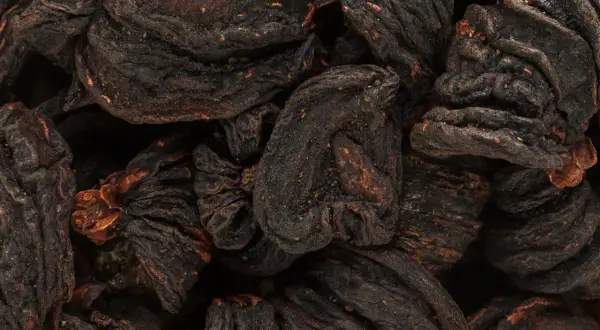 Suszone owoce Garcinia Cambogia, znane z właściwości wspomagających odchudzanie.