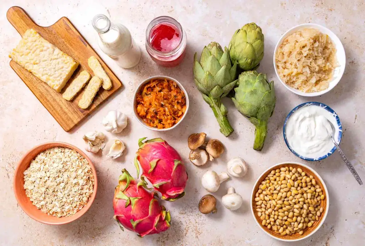 Produkty wspierające odporność: tempeh, mleko, kiszonki, karczochy, czosnek, owsianka, smoczy owoc, grzyby, jogurt, fasola.